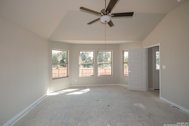 spare room with ceiling fan and lofted ceiling