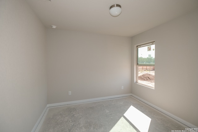 empty room featuring concrete floors