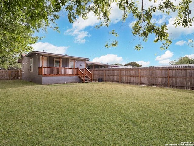 view of yard featuring a deck