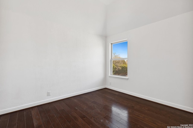 unfurnished room with hardwood / wood-style floors