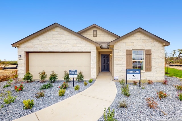 view of front of home with a garage