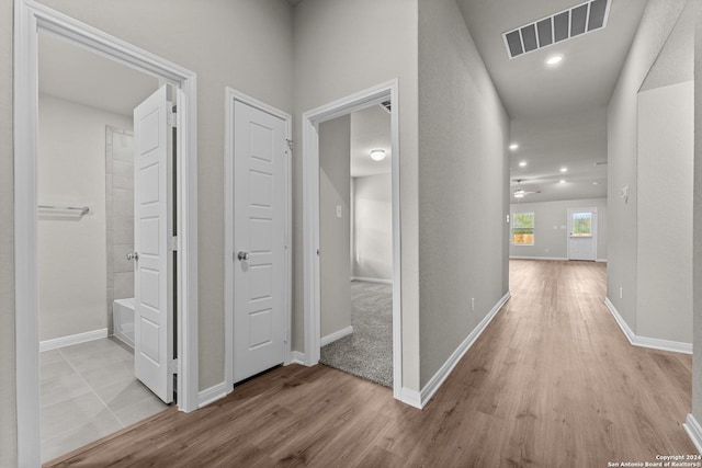 hallway featuring light wood-type flooring