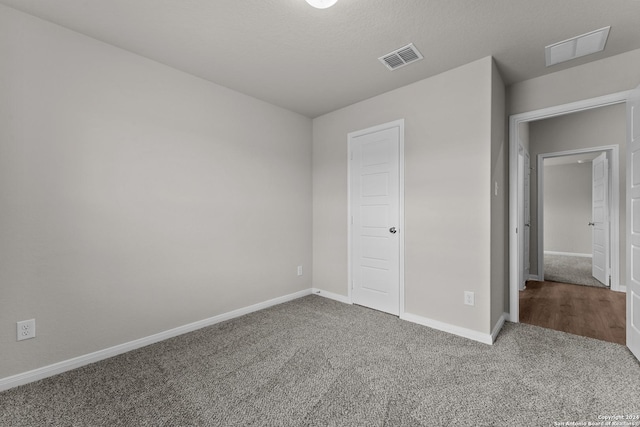 unfurnished bedroom featuring carpet flooring