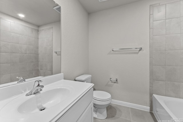 bathroom with tile patterned floors, vanity, and toilet