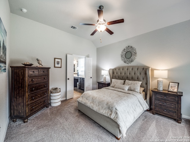 bedroom featuring ensuite bathroom, ceiling fan, lofted ceiling, and light colored carpet