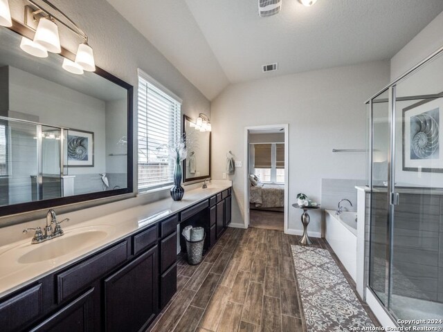 full bathroom featuring shower / bath combination with curtain, toilet, and vanity