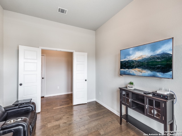 interior space with dark hardwood / wood-style flooring