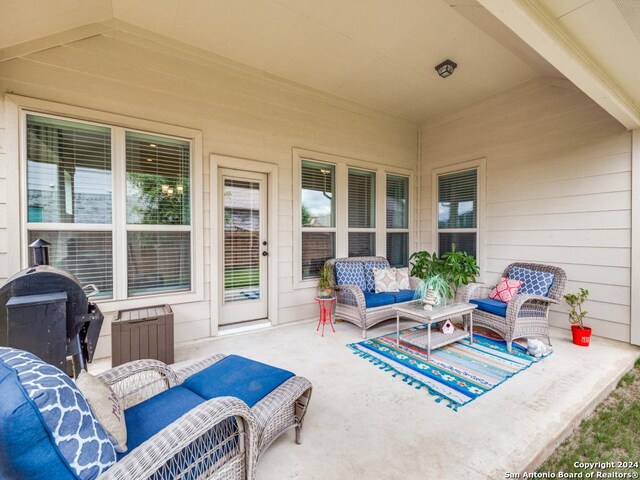 back of house with a patio area and a lawn