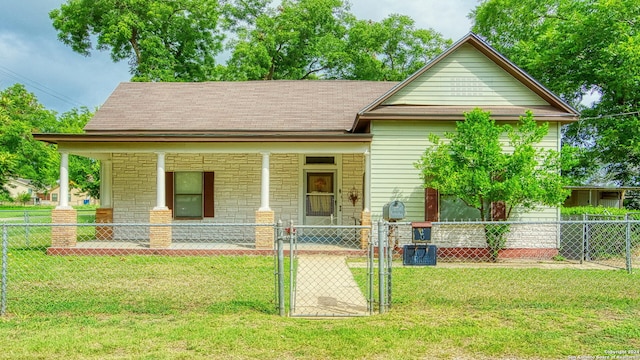 bungalow-style house with a porch and a front lawn