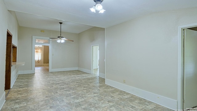 tiled empty room with ceiling fan