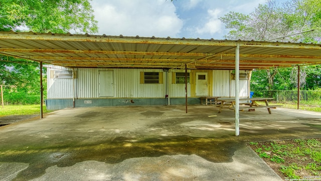 view of patio / terrace featuring a carport