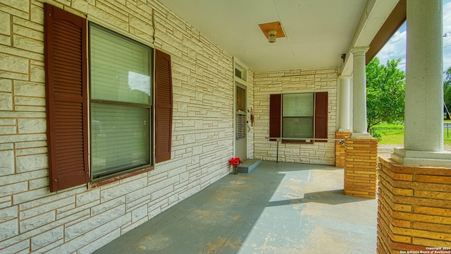 view of patio featuring covered porch