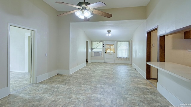 spare room featuring light tile patterned flooring, ceiling fan, and cooling unit