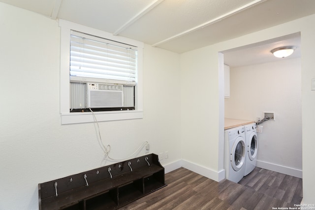 washroom featuring cooling unit, washing machine and dryer, and dark hardwood / wood-style flooring