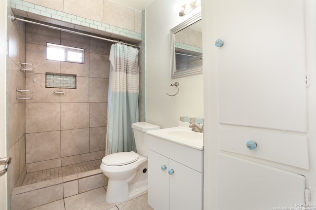 bathroom featuring vanity, walk in shower, toilet, and tile patterned floors