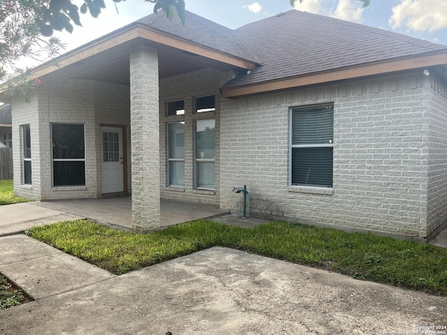 back of house featuring a patio area