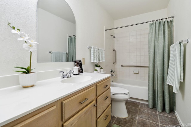 full bathroom featuring vanity, tile patterned flooring, shower / bath combination with curtain, and toilet