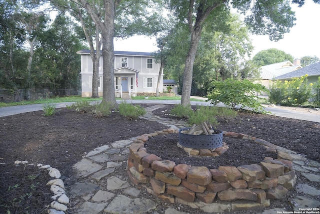 view of front of home with a fire pit