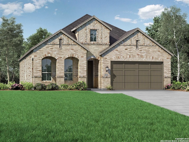 view of front facade featuring a garage and a front lawn