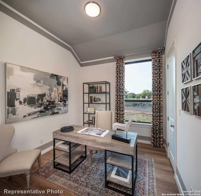 office area featuring vaulted ceiling and hardwood / wood-style flooring