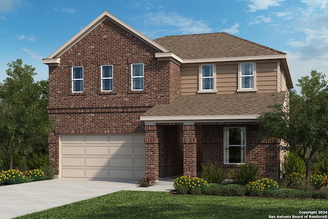 front facade featuring a garage and a front yard