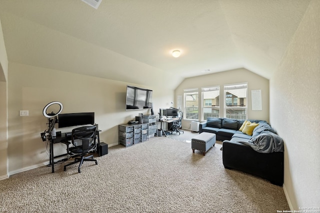 carpeted living room featuring lofted ceiling