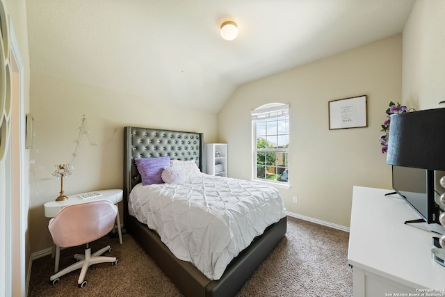 carpeted bedroom with lofted ceiling