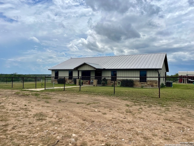 view of front of property with central AC