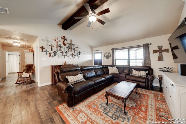 living room with hardwood / wood-style floors, vaulted ceiling with beams, and ceiling fan