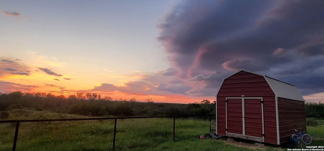 view of outdoor structure at dusk