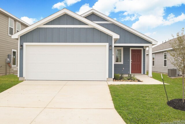 garage with a lawn