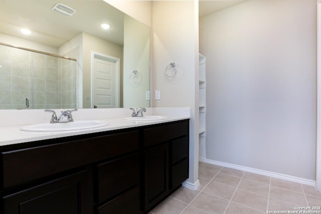 bathroom featuring tile patterned floors and vanity