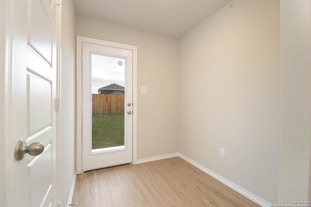 doorway featuring light wood-type flooring