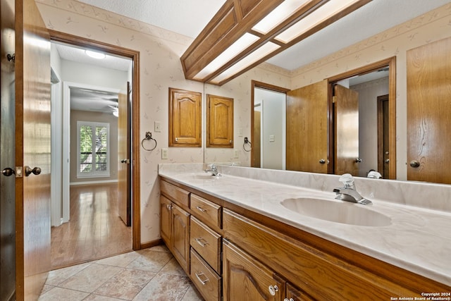 bathroom featuring vanity and tile patterned flooring