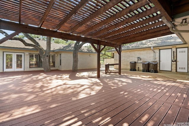 wooden deck featuring a pergola