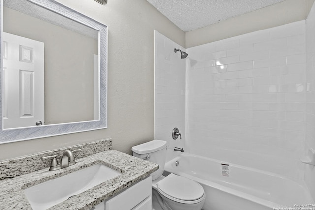 bathroom featuring toilet, a textured ceiling, shower / bathing tub combination, vanity, and a textured wall