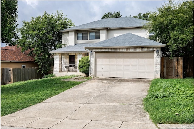 view of front facade with driveway, brick siding, an attached garage, and fence