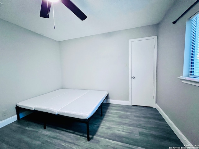 bedroom featuring hardwood / wood-style flooring and ceiling fan