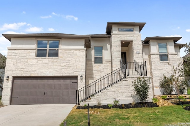 146 Sonrisa, Boerne, TX 78006 - prairie-style house featuring a garage and a front lawn