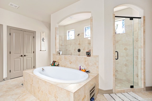 1007 Boulder Cyn, San Antonio, TX 78260 - full bathroom featuring tile patterned floors, a garden tub, visible vents, and a stall shower