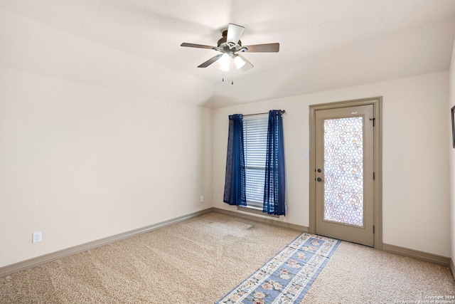 carpeted spare room with ceiling fan and a healthy amount of sunlight