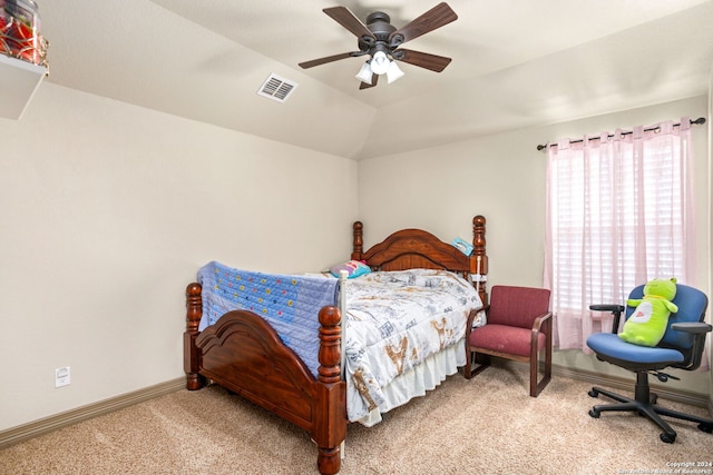 bedroom with lofted ceiling, light carpet, multiple windows, and ceiling fan