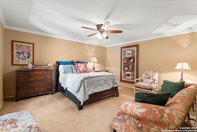 carpeted bedroom featuring ornamental molding and ceiling fan