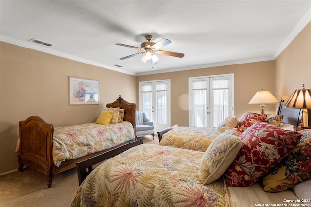 bedroom featuring carpet, french doors, crown molding, and ceiling fan