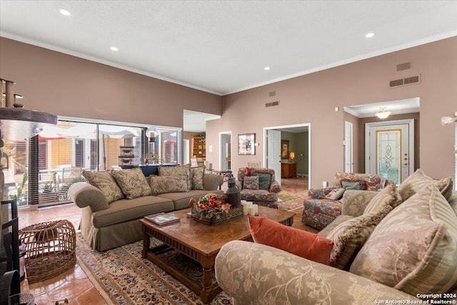 tiled living room featuring ornamental molding