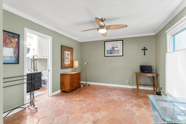 living area featuring ornamental molding, a textured ceiling, light tile patterned floors, and ceiling fan