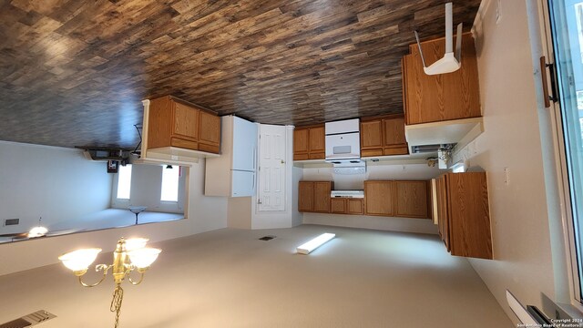 kitchen with a chandelier