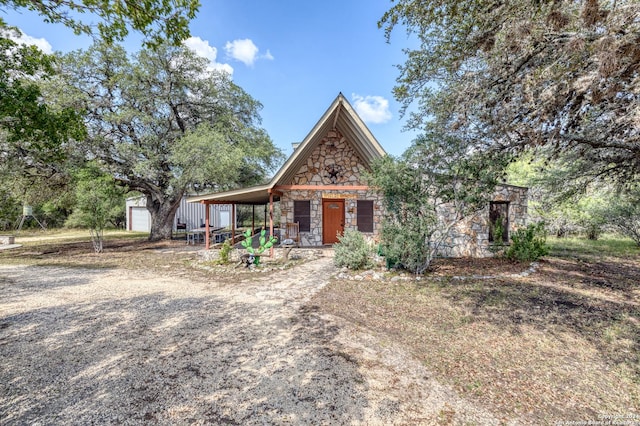 view of front of house with a garage and a porch