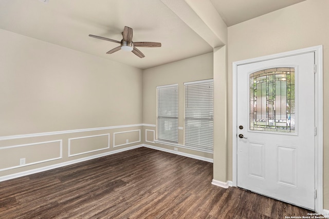 foyer entrance with ceiling fan and dark hardwood / wood-style floors