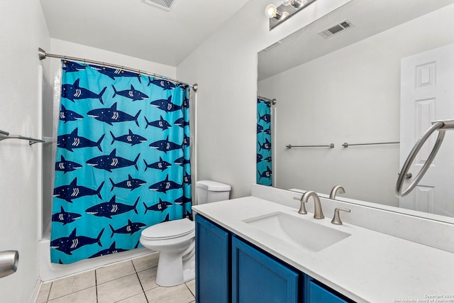 bathroom with toilet, vanity, a shower with curtain, and tile patterned flooring